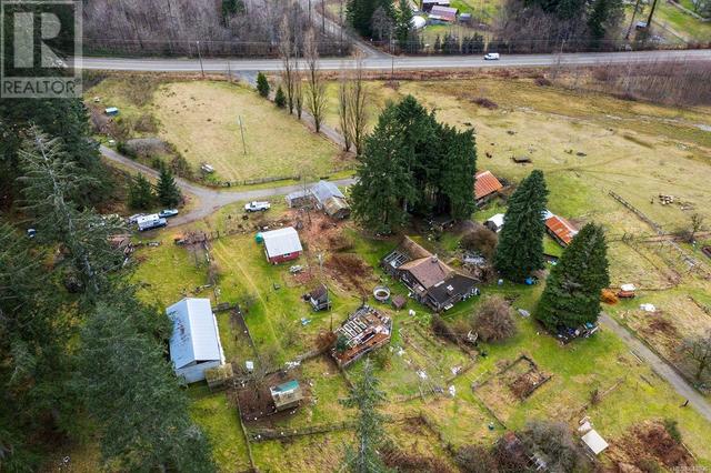 7522 Island Hwy N, House detached with 4 bedrooms, 3 bathrooms and 10 parking in Comox Valley C (Puntledge   Black Creek) BC | Image 13
