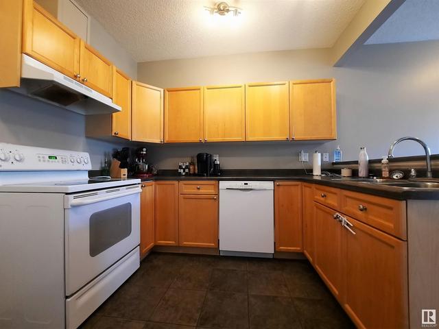 6 - 2508 Hanna Cr Nw, House attached with 2 bedrooms, 1 bathrooms and 2 parking in Edmonton AB | Image 1
