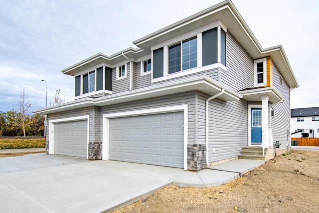 50 Earl Close, Home with 3 bedrooms, 2 bathrooms and 4 parking in Red Deer County AB | Image 6