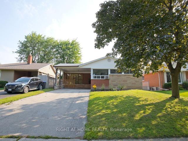 28 Ladore Dr, House detached with 4 bedrooms, 2 bathrooms and 6 parking in Brampton ON | Image 1