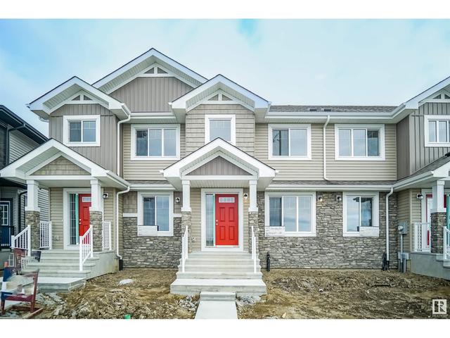 497 Glenridding Ravine Dr Sw, House attached with 3 bedrooms, 2 bathrooms and null parking in Edmonton AB | Image 1