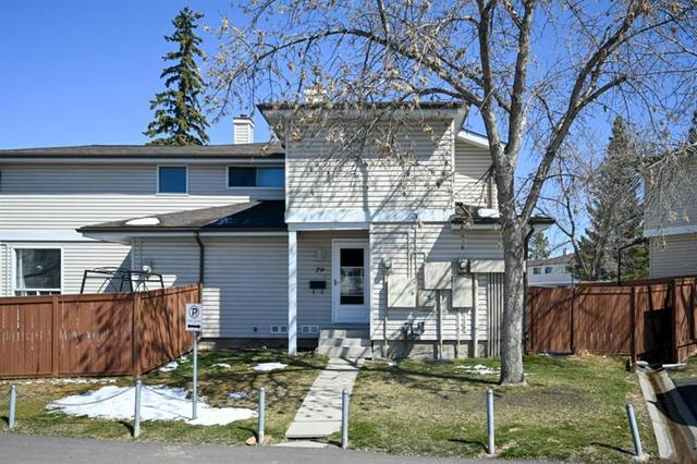 79, - 1155 Falconridge Drive Ne, House attached with 2 bedrooms, 1 bathrooms and 1 parking in Calgary AB | Card Image