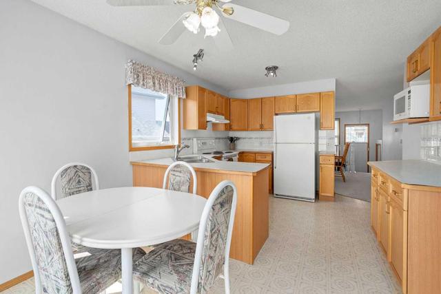 24 Woodside Park Nw, House detached with 3 bedrooms, 3 bathrooms and 2 parking in Airdrie AB | Image 11