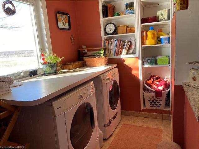 Laundry room, nice natural lighting and also very convenient shelving. | Image 39