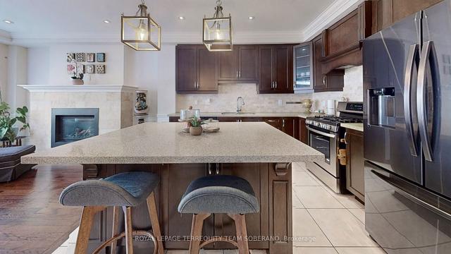 100 Falstaff Ave, House detached with 4 bedrooms, 4 bathrooms and 5.5 parking in Toronto ON | Image 9
