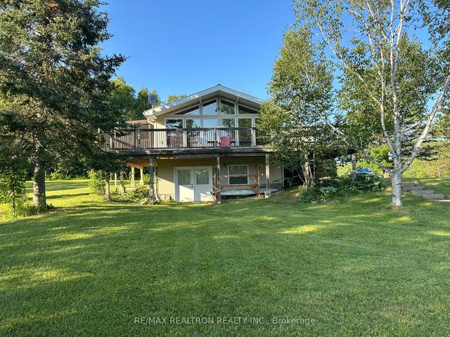 3 Magnet Rd, House detached with 3 bedrooms, 1 bathrooms and 8 parking in Magnetawan ON | Image 1