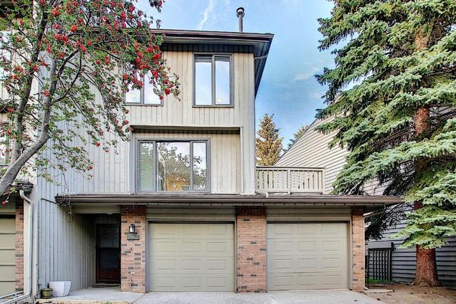 3934 Point Mckay Road Nw, Home with 3 bedrooms, 2 bathrooms and 4 parking in Calgary AB | Image 1