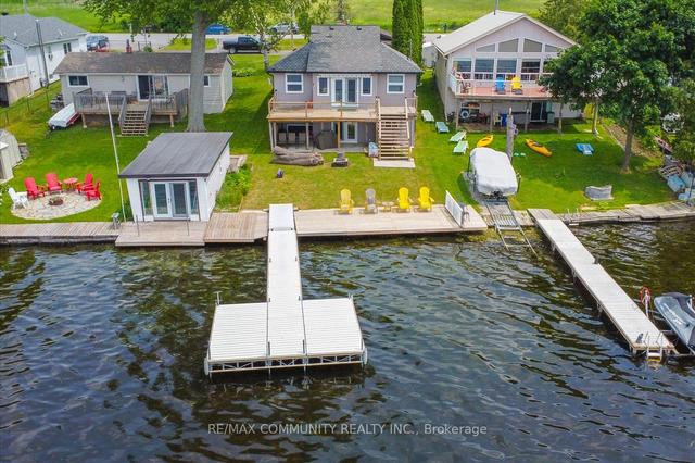 213 Snug Harbour Rd W, House detached with 2 bedrooms, 2 bathrooms and 5 parking in Kawartha Lakes ON | Image 1