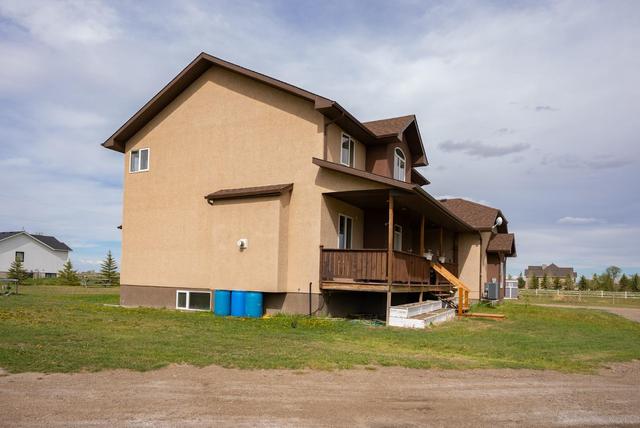 211004 Twp Rd 8 5, House detached with 5 bedrooms, 3 bathrooms and 4 parking in Lethbridge County AB | Image 4