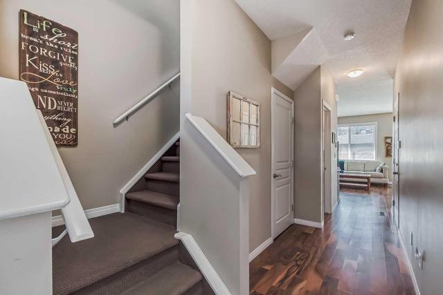 10 Everridge Gardens Sw, Home with 2 bedrooms, 2 bathrooms and 2 parking in Calgary AB | Image 5