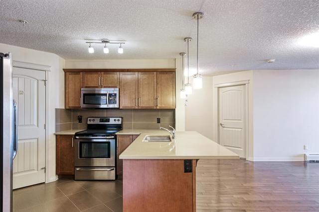 2212 - 175 Panatella Hill Nw, Condo with 2 bedrooms, 2 bathrooms and 1 parking in Calgary AB | Image 5