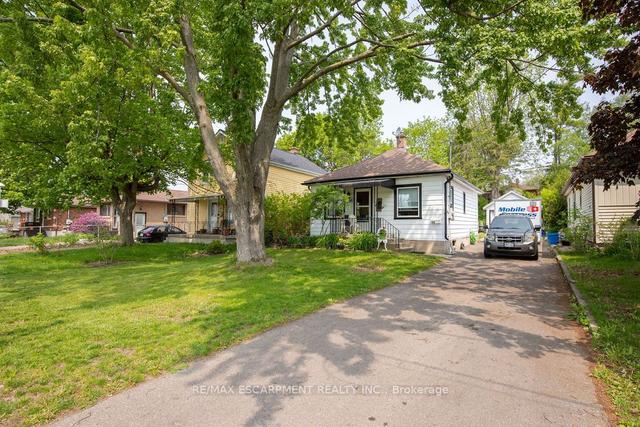 396 Wellington St, House detached with 2 bedrooms, 1 bathrooms and 7 parking in Brantford ON | Image 1