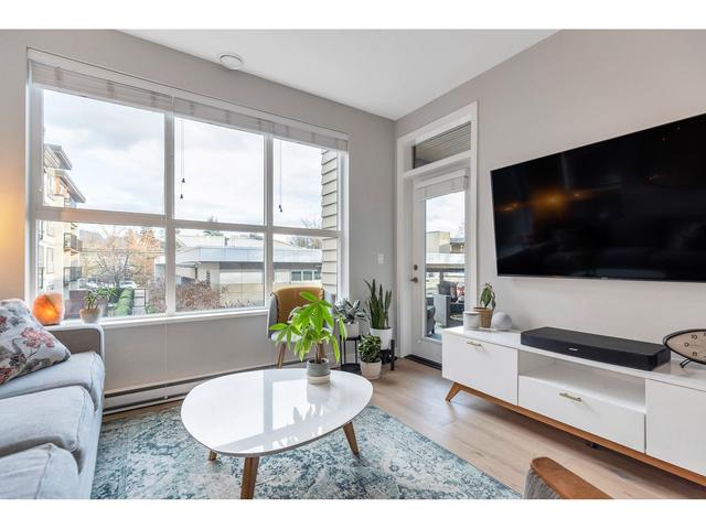 207 - 3205 Mountain Highway, Condo with 2 bedrooms, 2 bathrooms and 1 parking in North Vancouver BC | Card Image