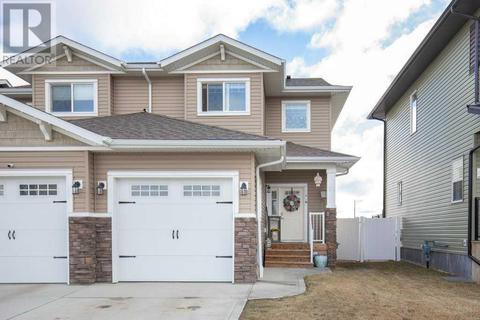 51 Iron Gate Boulevard, House semidetached with 3 bedrooms, 2 bathrooms and 2 parking in Sylvan Lake AB | Card Image
