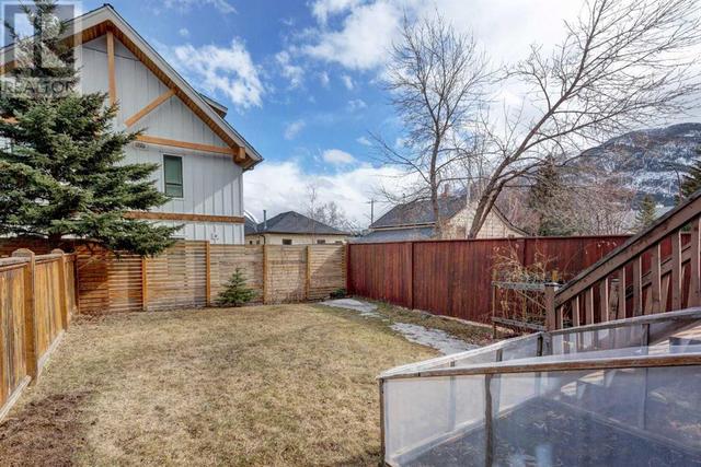 328 Squirrel Street, House detached with 4 bedrooms, 3 bathrooms and 4 parking in Banff AB | Image 39