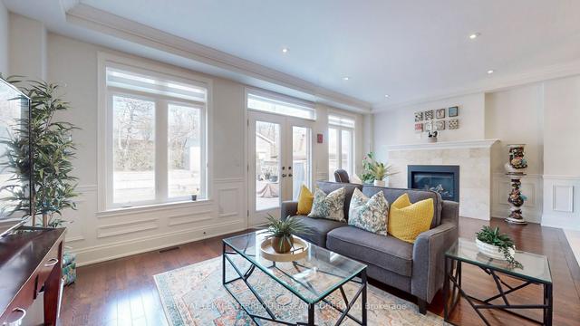 100 Falstaff Ave, House detached with 4 bedrooms, 4 bathrooms and 5.5 parking in Toronto ON | Image 3
