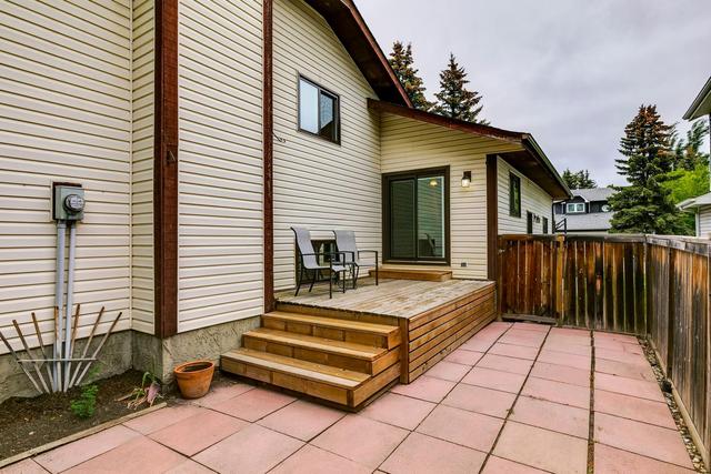23 Woodstock Road Sw, House detached with 5 bedrooms, 3 bathrooms and 2 parking in Calgary AB | Image 42