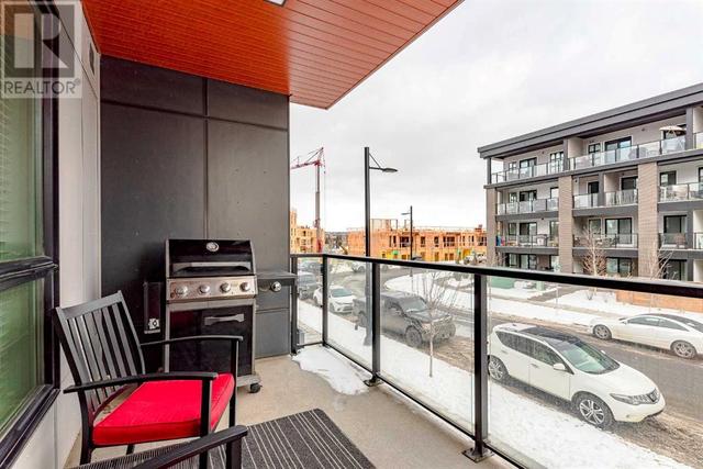 205, - 383 Smith Street Nw, Condo with 2 bedrooms, 2 bathrooms and 1 parking in Calgary AB | Image 21