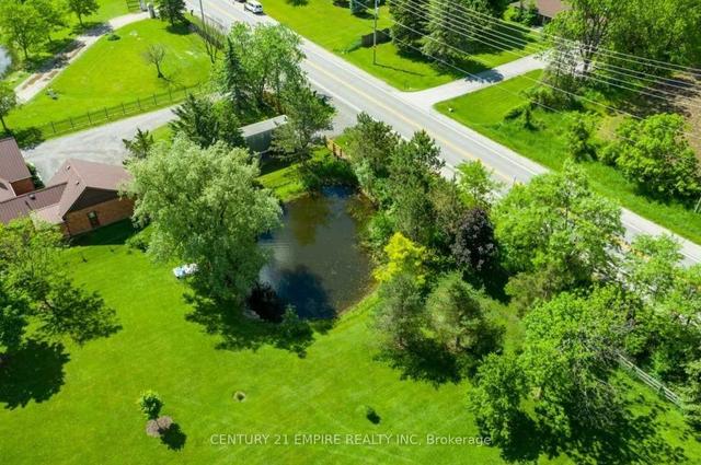 11739 Guelph Line, House detached with 3 bedrooms, 5 bathrooms and 18 parking in Milton ON | Image 33
