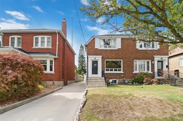 78 Watson Ave, House semidetached with 2 bedrooms, 2 bathrooms and 4 parking in Toronto ON | Card Image