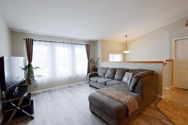 9057 131 Avenue, Home with 4 bedrooms, 2 bathrooms and 2 parking in Greenview No. 16 AB | Image 3