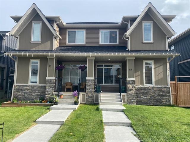 13 Emberside Hollow, House semidetached with 3 bedrooms, 3 bathrooms and 2 parking in Cochrane AB | Card Image