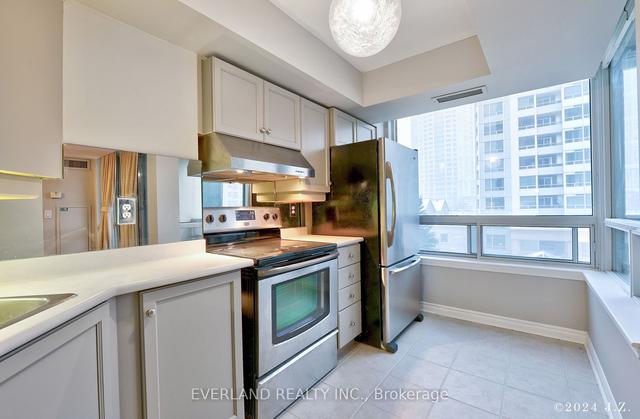 412 - 8 Rean Dr, Condo with 2 bedrooms, 2 bathrooms and 1 parking in Toronto ON | Image 4