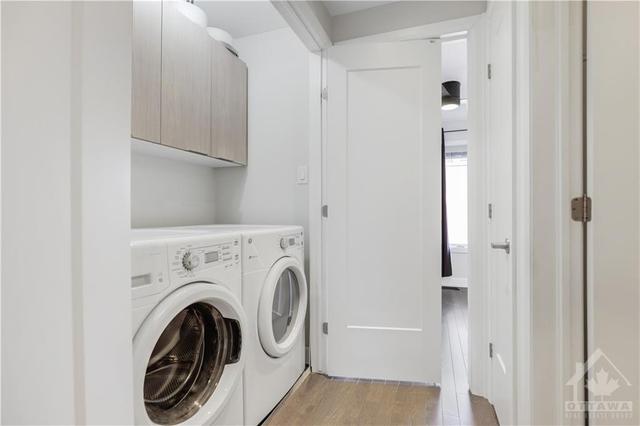 The laundry room is conveniently located on the 3rd level adjacent to the bedrooms | Image 20
