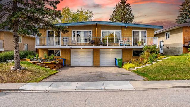 3768 36 Avenue Sw, Home with 4 bedrooms, 2 bathrooms and 2 parking in Calgary AB | Image 1