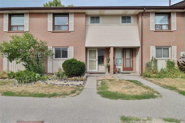 11 - 527 Woodlawn Rd E, Townhouse with 3 bedrooms, 2 bathrooms and 1 parking in Guelph ON | Card Image