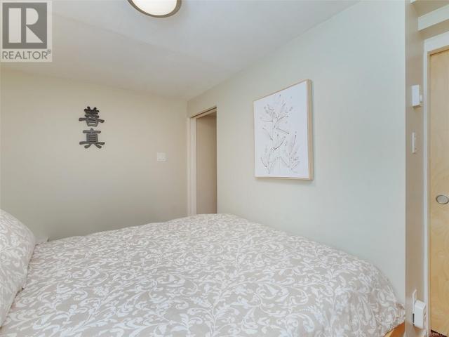 Bedroom in lower level suite one | Image 39