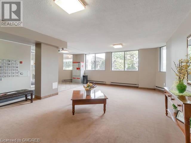 604 - 81 Millside Drive, House attached with 2 bedrooms, 1 bathrooms and null parking in Milton ON | Image 3