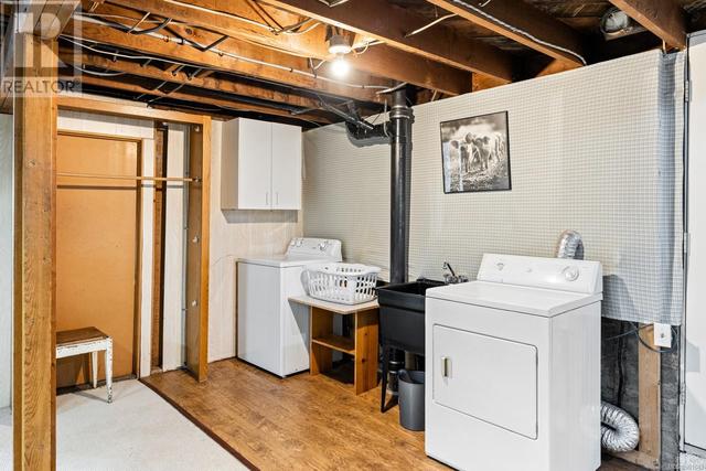 Downstairs laundry room | Image 16