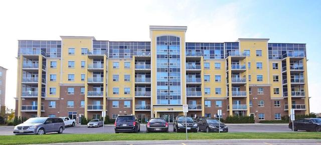 203 - 1419 Costigan Rd, Condo with 2 bedrooms, 2 bathrooms and 1 parking in Milton ON | Image 1