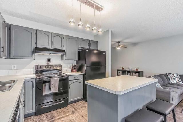 214 Mt Douglas Manor Se, Home with 3 bedrooms, 1 bathrooms and 2 parking in Calgary AB | Image 3