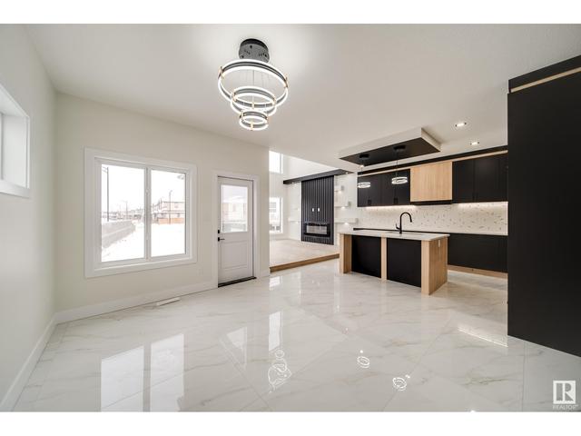 16603 32 Av Sw, House detached with 5 bedrooms, 3 bathrooms and null parking in Edmonton AB | Image 4