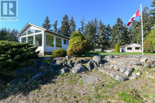 501 Arbutus Bay Rd, House detached with 3 bedrooms, 3 bathrooms and 10 parking in Comox Valley A BC | Image 41