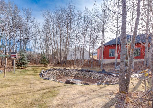 16 Woodland Rise, House detached with 6 bedrooms, 5 bathrooms and null parking in Rocky View County AB | Image 47