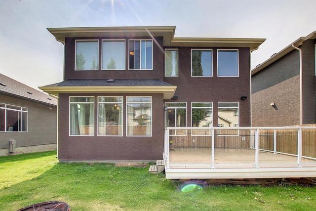 64 Elmont Rise Sw, House detached with 4 bedrooms, 3 bathrooms and 4 parking in Calgary AB | Card Image