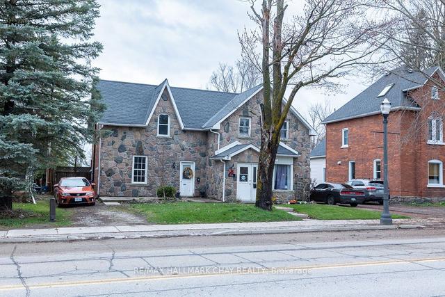 74 Queen St W, House detached with 1 bedrooms, 2 bathrooms and 4 parking in Springwater ON | Image 7