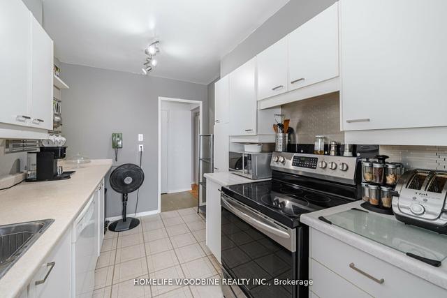 1009 - 44 Longbourne Dr, Condo with 3 bedrooms, 2 bathrooms and 2 parking in Toronto ON | Image 7