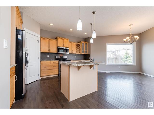 7716 8 Av Sw, House detached with 4 bedrooms, 3 bathrooms and null parking in Edmonton AB | Image 11