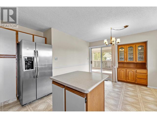 1276 Rio Drive, House detached with 4 bedrooms, 2 bathrooms and 6 parking in Kelowna BC | Image 11