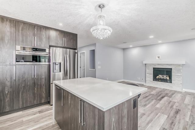 105 Hillcrest Drive Sw, House detached with 5 bedrooms, 3 bathrooms and 2 parking in Airdrie AB | Image 8
