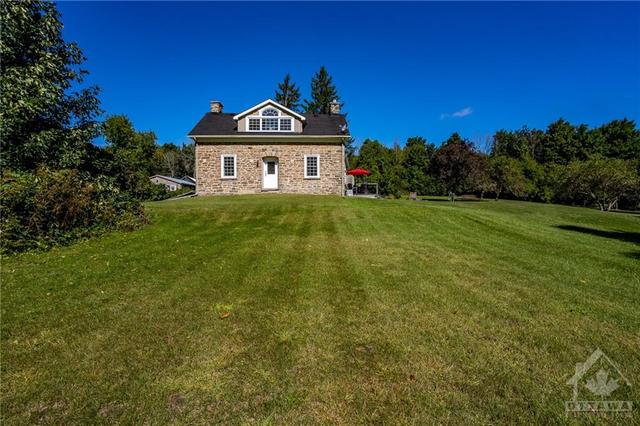 2415 County Rd 20 Road, House detached with 3 bedrooms, 3 bathrooms and 12 parking in North Grenville ON | Image 4