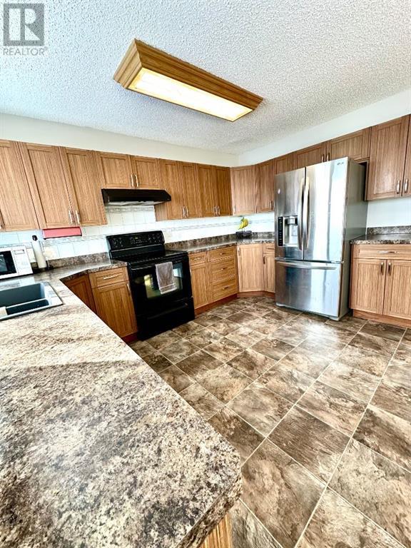 9239 107 Avenue, House detached with 4 bedrooms, 2 bathrooms and 4 parking in Grande Prairie AB | Image 7