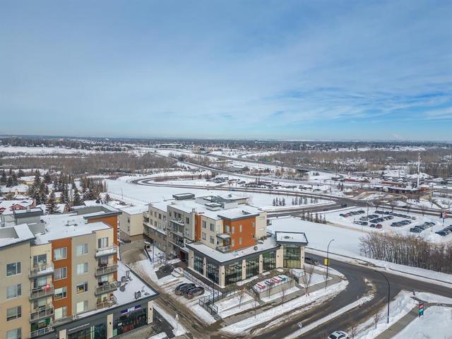 208 - 30 Shawnee Common Sw, Condo with 2 bedrooms, 2 bathrooms and 1 parking in Calgary AB | Image 21