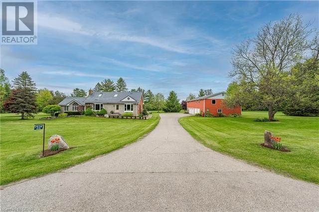 7939 Mill Road, House detached with 3 bedrooms, 2 bathrooms and 10 parking in Guelph/Eramosa ON | Card Image