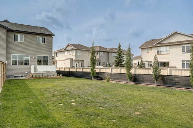 340 Quigley Drive, Home with 4 bedrooms, 3 bathrooms and 2 parking in Cochrane AB | Image 34