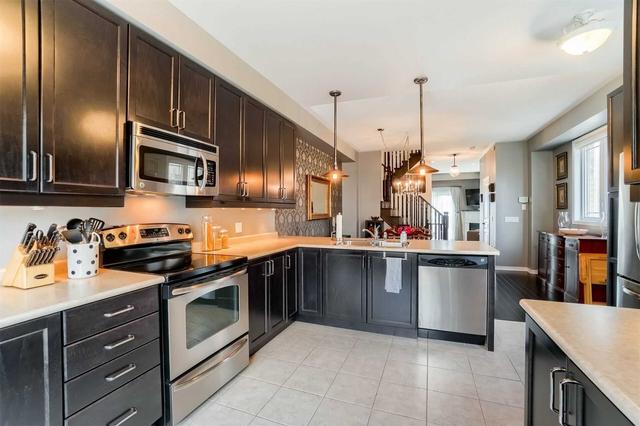 12 - 6625 Falconer Dr, Townhouse with 2 bedrooms, 3 bathrooms and 2 parking in Mississauga ON | Image 1